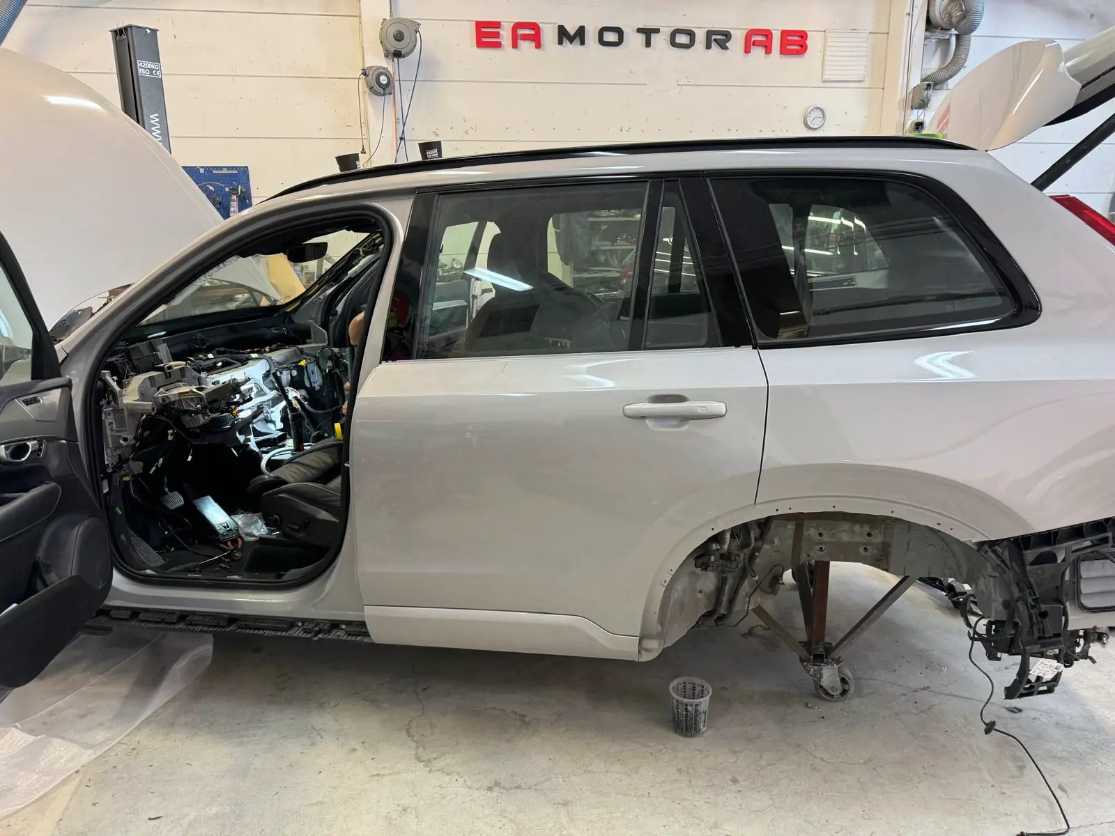 Car with dismantled interior under repair in the workshop